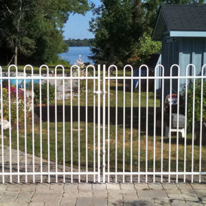 white wrought iron fencing with gate