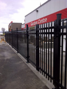 Wrought iron fencing surrounding garden centre area of business