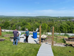 preparing to build a fence along the edge of an overview