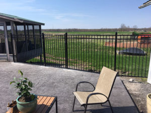 wrought-iron fencing around patio